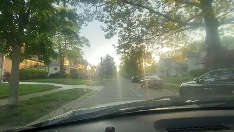 Golden hour glow on a quiet suburban street.